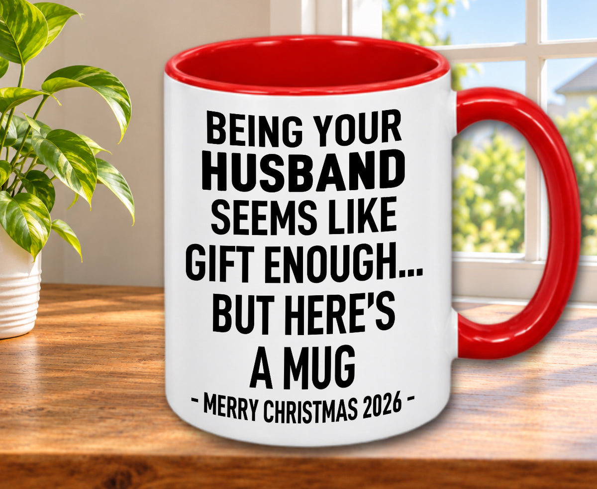BEING YOUR HUSBAND SEEMS LIKE GIFT ENOUGH... BUT HERE’S A MUG - MERRY CHRISTMAS 2026 - Gift Accent Coffee Mug (MUG1119 09)